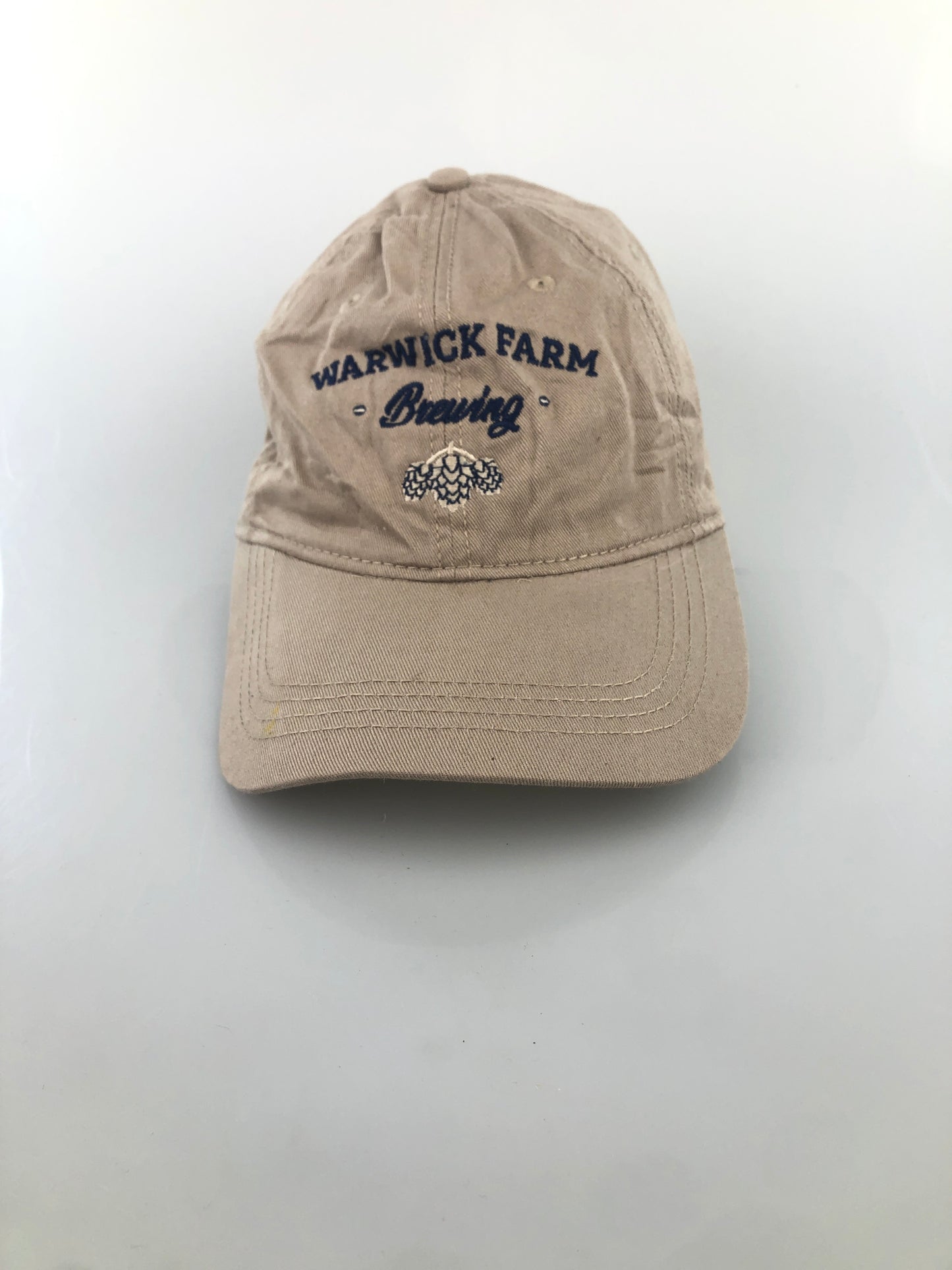 Gorra Caqui Warwick Farm