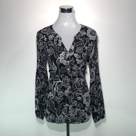 Blusa Negro de Flores Investments