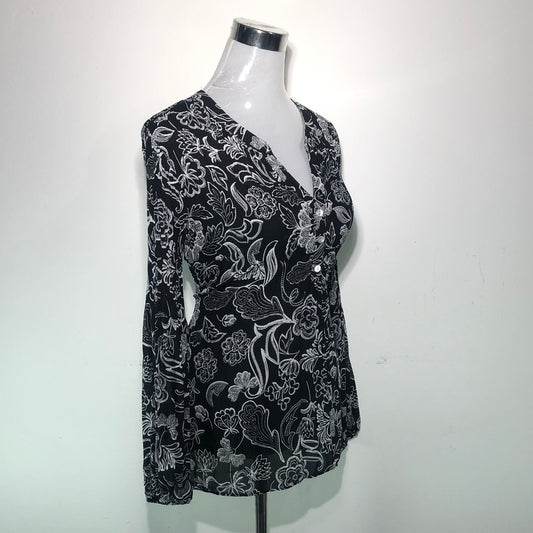 Blusa Negro de Flores Investments