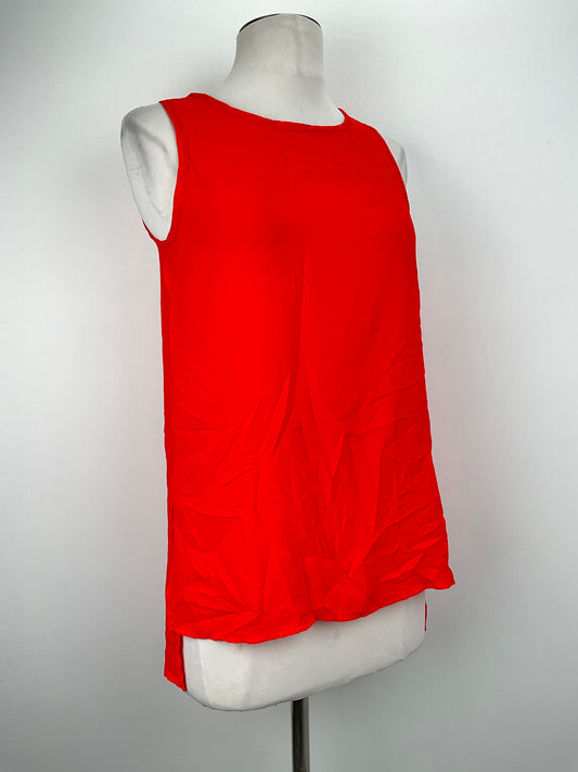 Blusa Naranja Happening in The Present