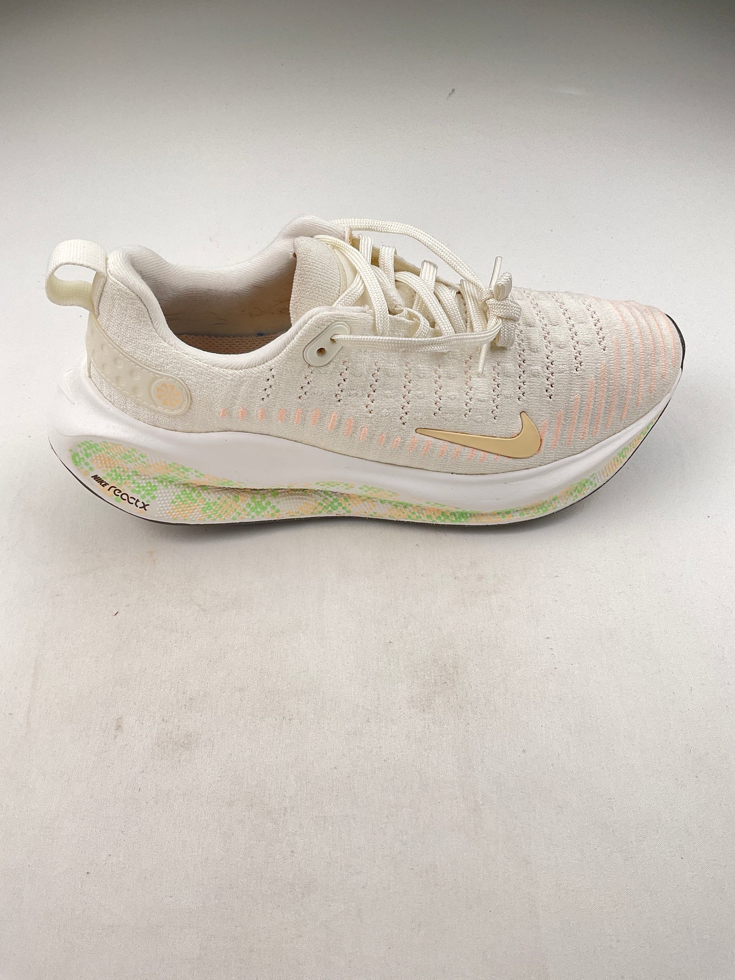 Tenis crema Nike react