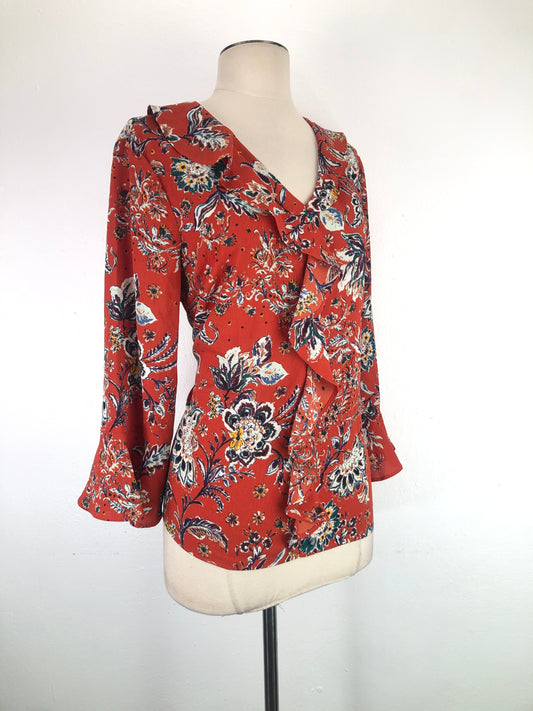 Blusa Naranja de Flores Investments